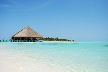 Image showing Bungalow's architecture and beach on a Maldivian Island