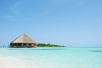 Image showing Bungalow's architecture and beach on a Maldivian Island