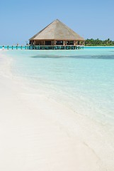 Image showing Bungalow's architecture and beach on a Maldivian Island