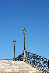 Image showing Vintage stairway with traditional lamp post (blue sky)