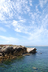 Image showing Huge rock at Baleal beach (dramatic cloudscape)