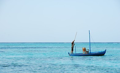 Image showing Typical Maldivian boat on blue ocean