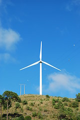 Image showing Wind turbine on the top of a mountain