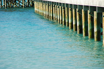 Image showing Wooden jetty bridge on a beautiful Maldivian beach