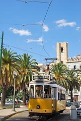 Image showing Cityscape of Lisbon city with Sé Cathedral and Yellow Tram