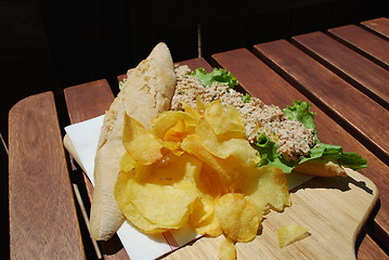 Image showing Tuna sandwich with beach front