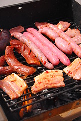 Image showing Tasty meal with fresh meat on grill