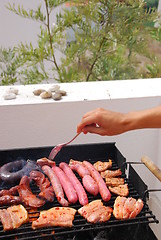 Image showing Tasty meal with fresh meat on grill