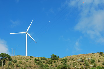 Image showing Wind turbine on the top of a mountain