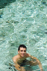 Image showing Young man relaxing and smiling in Maldives (ocean background)