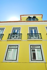 Image showing Bright sun with a traditional house building in Lisbon