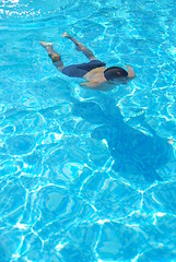 Image showing Young man swimming underwater