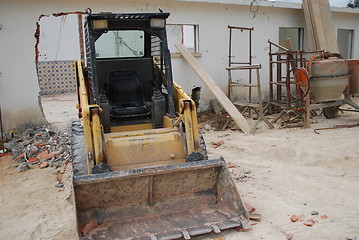 Image showing Yellow caterpillar before starting to work