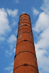 Image showing Tall Brick Chimney (Dismantled Industry) with blue sky background