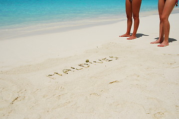 Image showing Maldives written in a sandy tropical beach