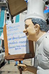 Image showing Chef holding whiteboard menu