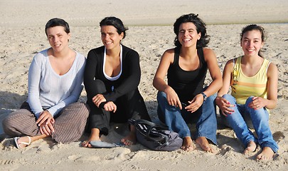 Image showing Happy sisters at the beach