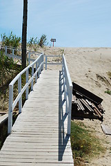 Image showing White boardwalk to local beach