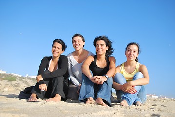 Image showing Smiling sisters at the beach