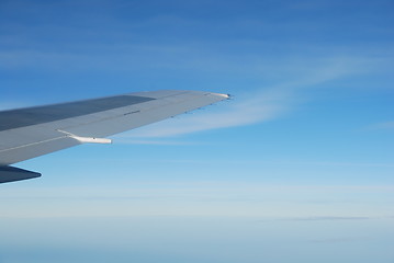 Image showing Airplane wing view (blue sky)