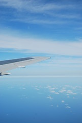 Image showing Airplane wing view with gorgeous clouscape