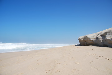 Image showing Small cliff at a beautiful beach in Praia del Rey