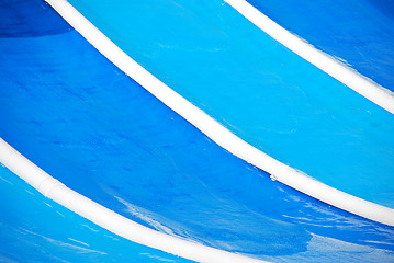 Image showing Blue waterslide in a water park