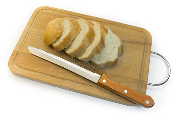 Image showing Bread, chopping board and knife