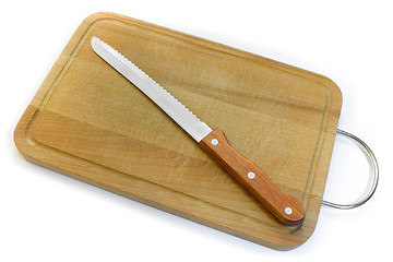 Image showing Chopping board and knife for bread