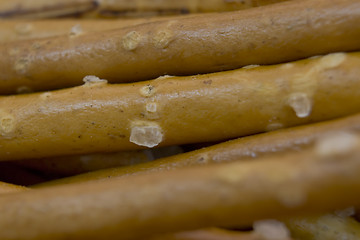 Image showing breadstick with salt