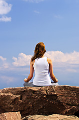 Image showing Young girl meditating