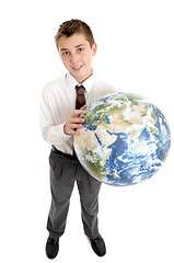 Image showing School student holding the world in his hands