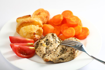 Image showing Herbed baked chicken breast meal