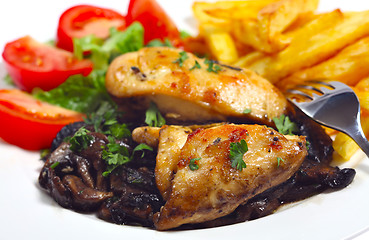 Image showing Chicken breast on a bed of fried mushrooms