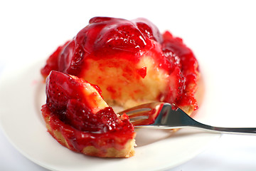 Image showing Strawberry tart broken open