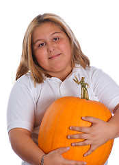 Image showing Girl Holding Pumpkin
