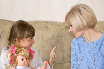 Image showing Mum and daughter with a doll