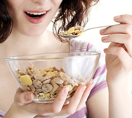 Image showing Young people eating milk with cereals