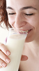 Image showing Young people eating milk with cereals