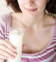 Image showing Young people eating milk with cereals