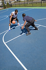 Image showing Men Playing Basketball