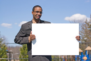 Image showing Man Holding a Sign