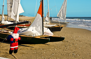 Image showing Santa Claus goes to the beach