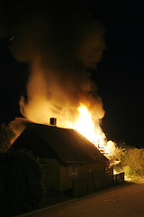 Image showing A house in fire in the middle of the night