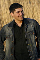 Image showing Young handsome man laughing