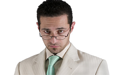 Image showing Businessman looking over his glasses