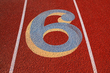 Image showing Number Six on a Running Lane