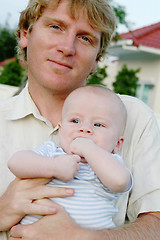 Image showing Father and son.