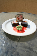 Image showing Sushi next to Wasabi and Sushi Ginger