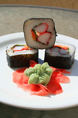 Image showing Sushi next to Wasabi and Sushi Ginger